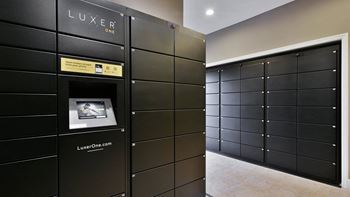 a selection of lockers in a locker room with a door